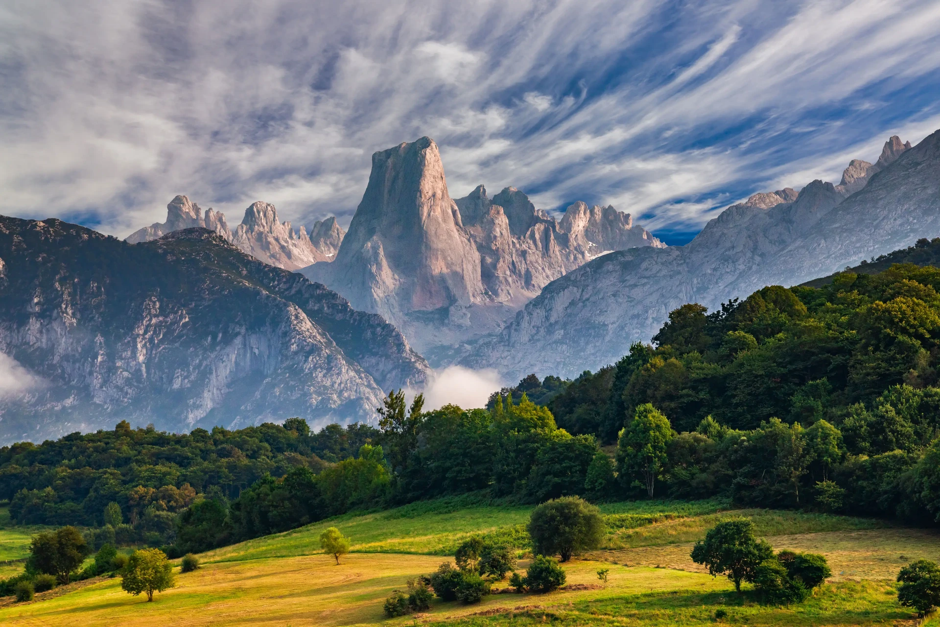 Naranjo de Bulnes rising over the green valleys of Asturias